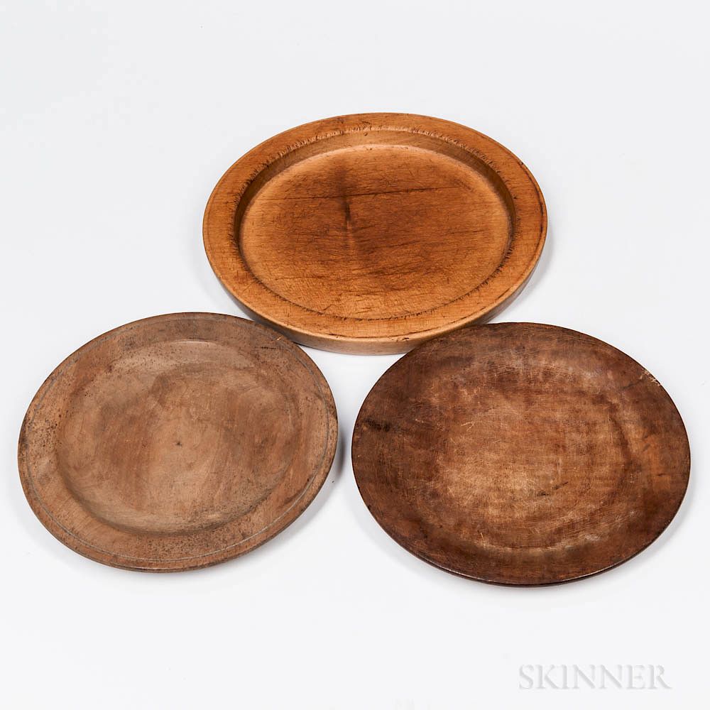 Appraisal: Three Treen Plates Three Treen Plates th th century a