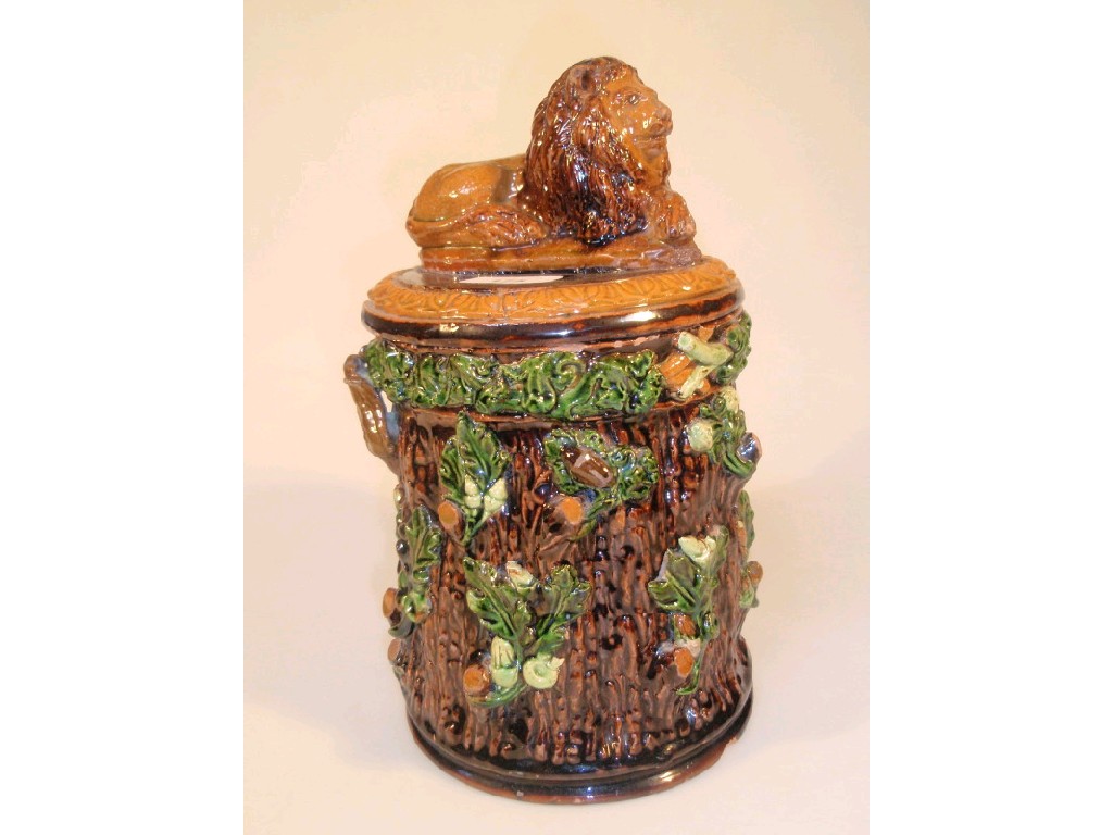 Appraisal: A German Majolica circular tobacco jar and cover as a