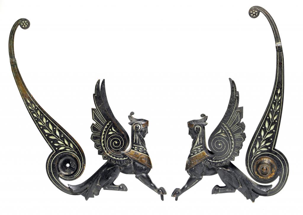 Appraisal: A PAIR OF VICTORIAN PARCEL-GILT AND PATINATED BRONZE SPHINX BRACKETS