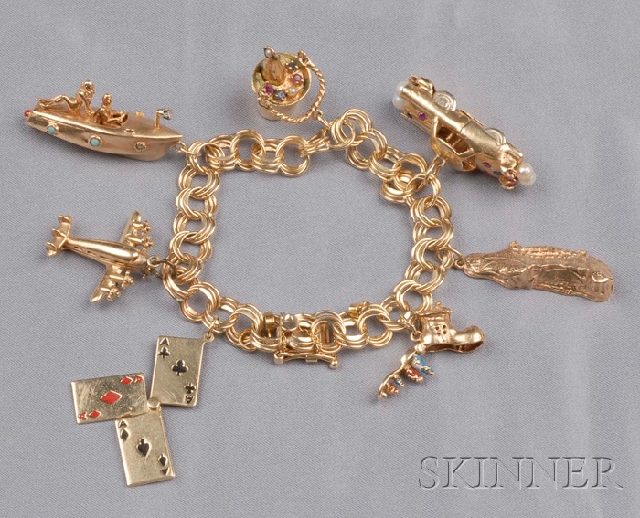 Appraisal: k Gold Charm Bracelet four aces an airplane ice bucket