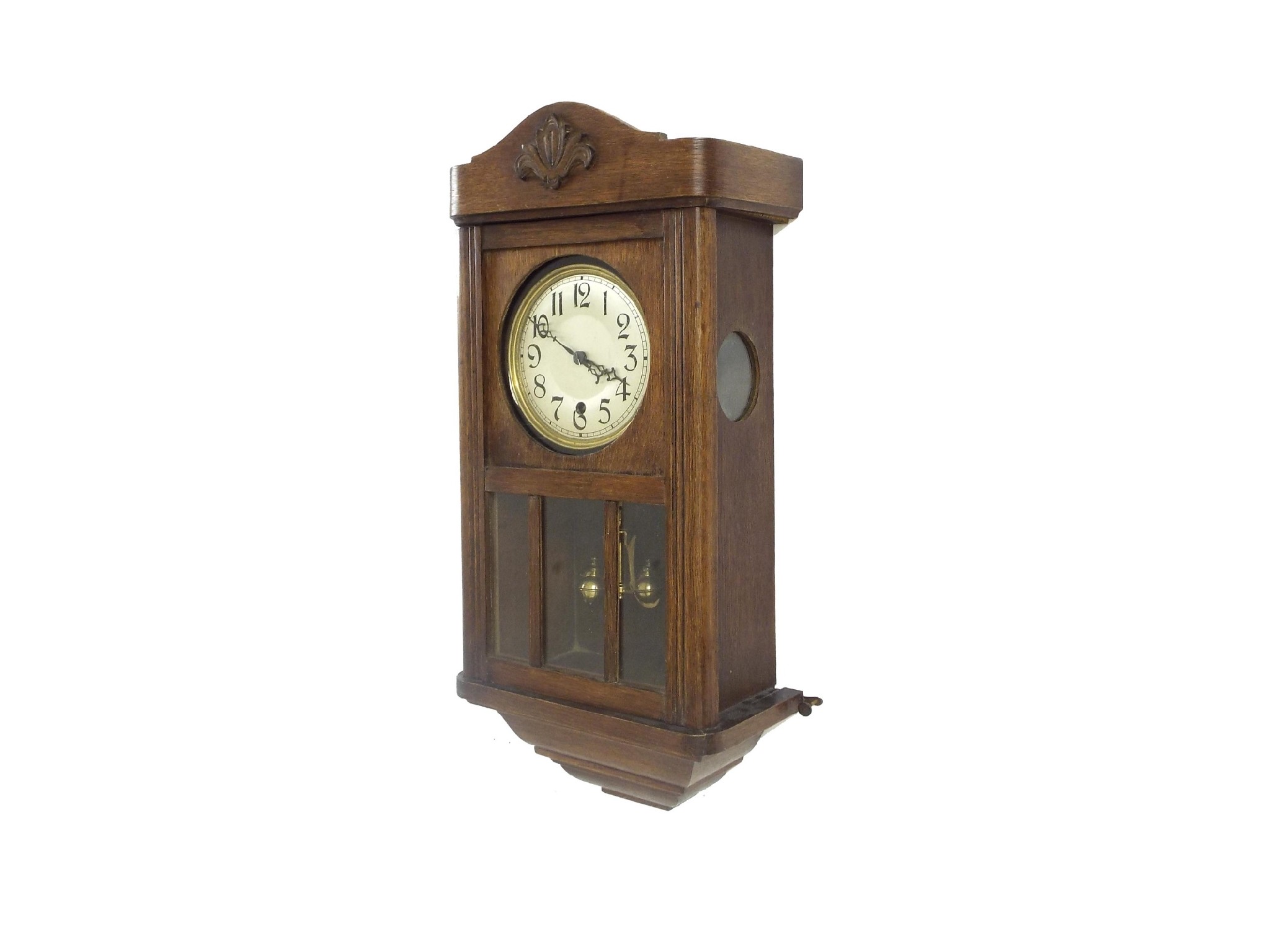 Appraisal: Oak torsion cased wall clock the large movement with front