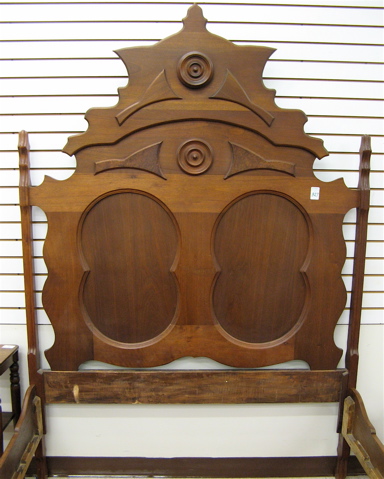 Appraisal: MID-VICTORIAN WALNUT BED WITH RAILS Rococo Revival design American c