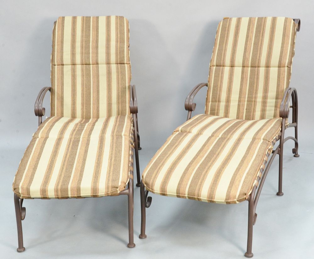 Appraisal: Pair of Woodard chaises with cushions and covers lg Pair