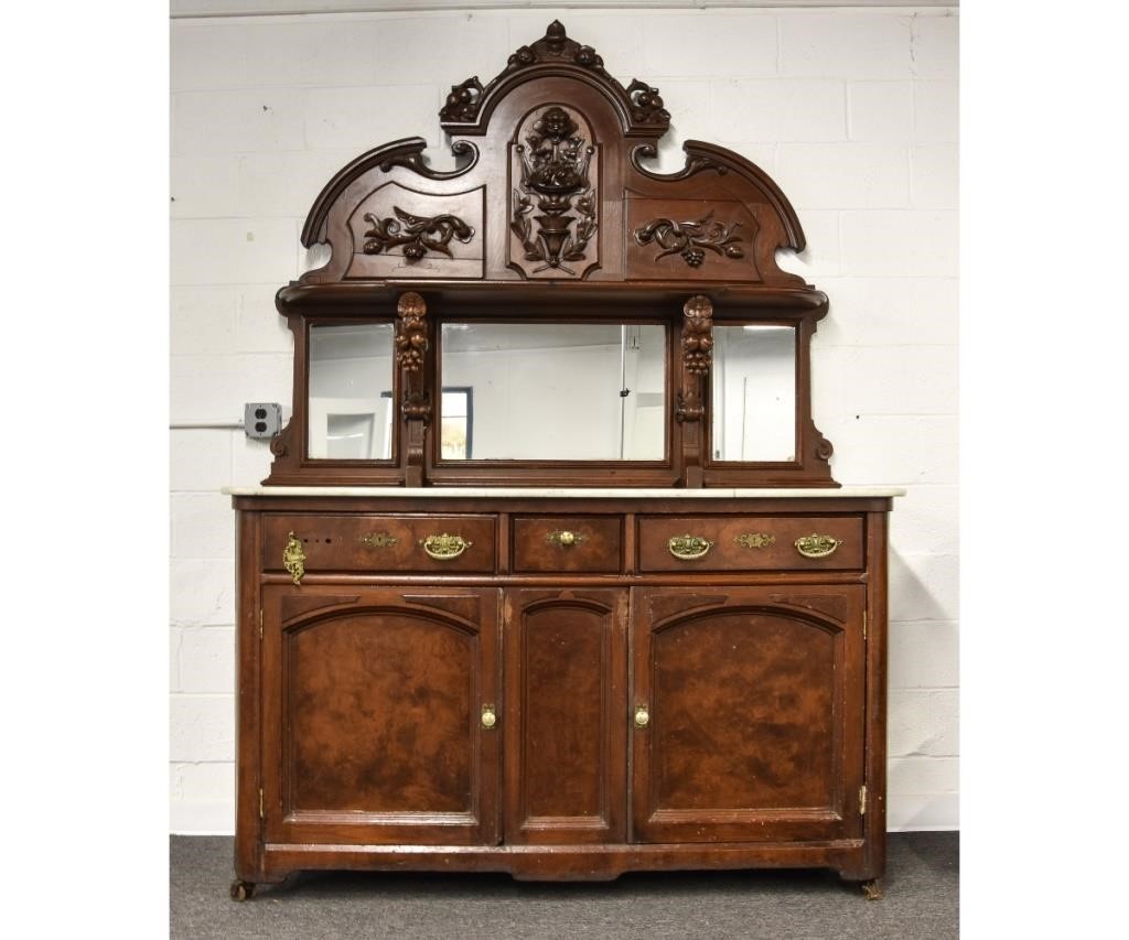 Appraisal: Victorian walnut sideboard upper section with carved mask and flowering