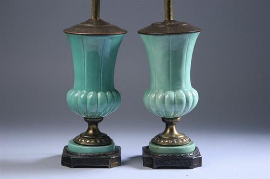 Appraisal: PAIR GREEN GLAZED PORCELAIN URNS th century Mounted as lamps