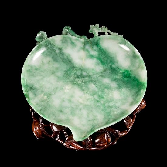 Appraisal: An Apple Green and Celadon Jadeite Peach-Form Ink Palette Length