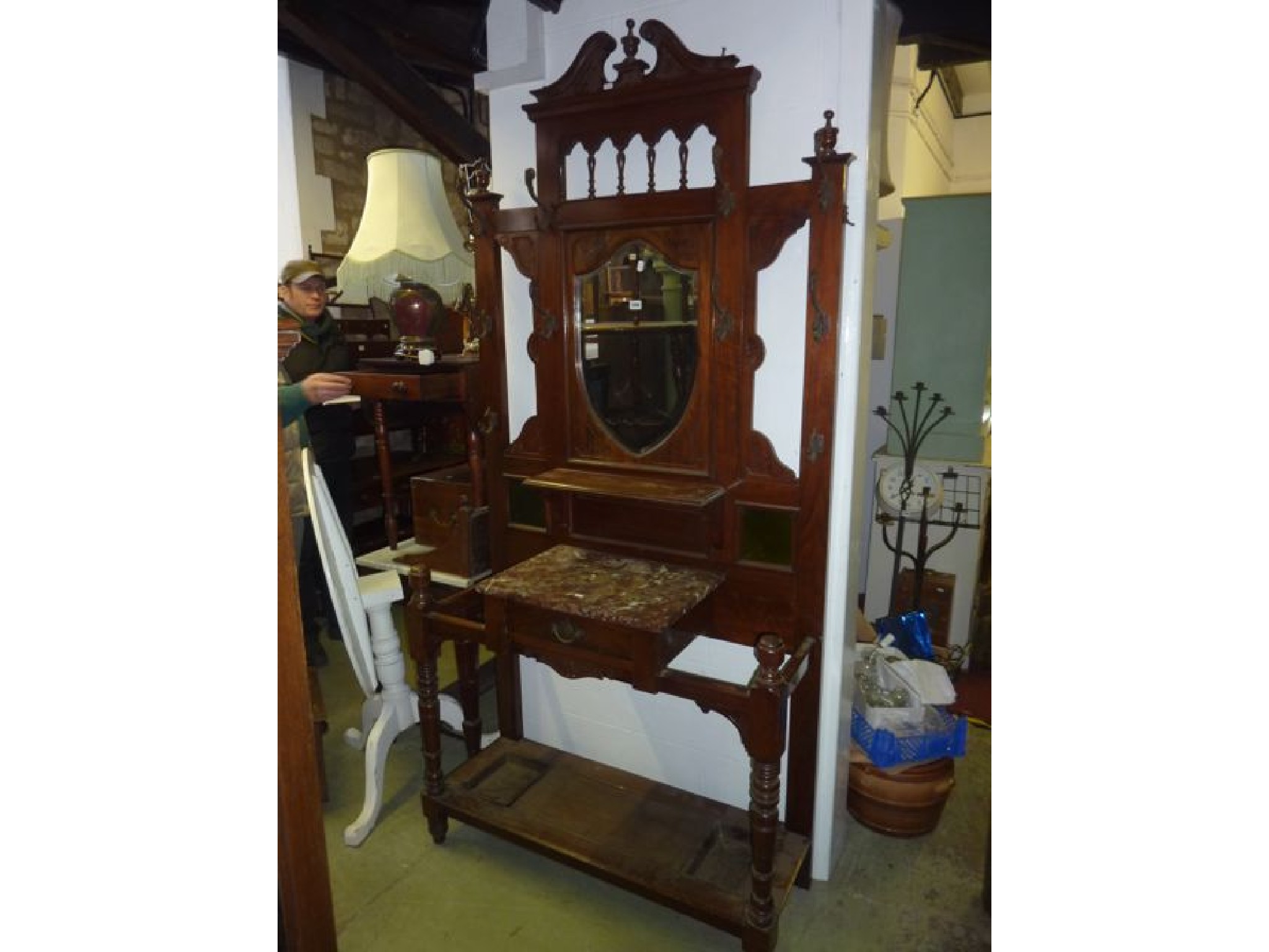 Appraisal: A large late Victorian walnut hallstand of full height the