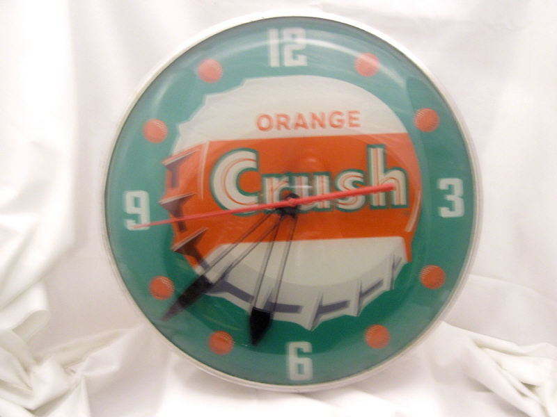 Appraisal: Orange Crush Bubble Face Clock Bubble face clock Green background