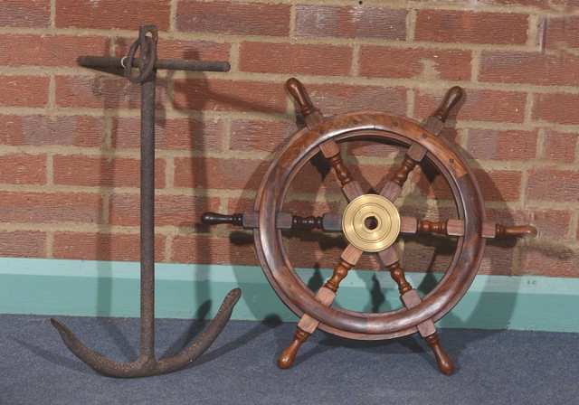 Appraisal: A HARDWOOD SHIPS WHEEL cm diameter and an old iron