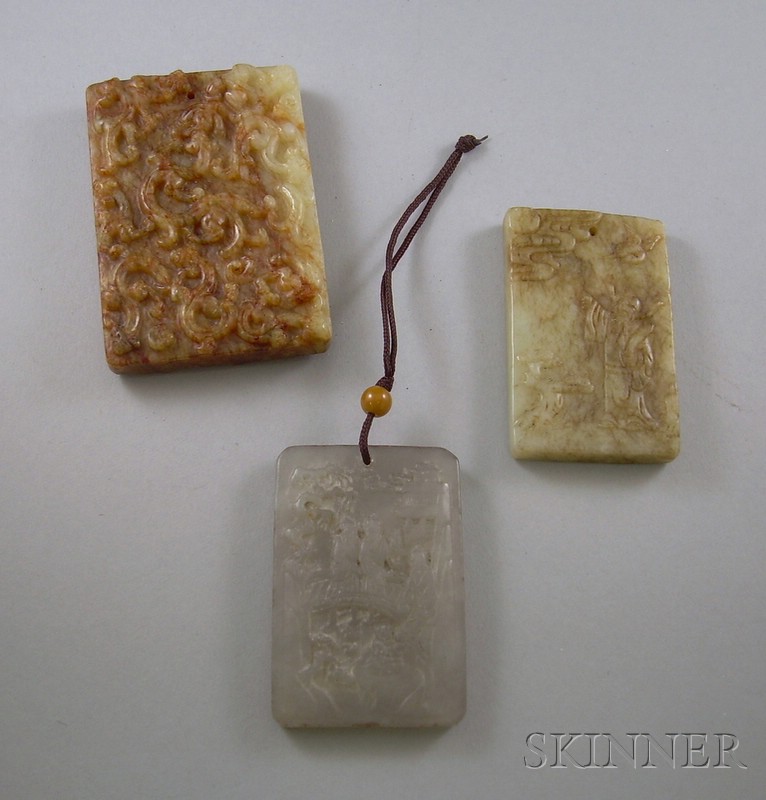 Appraisal: Three Rectangular Carved Jade Pendants depecting mythical beasts a water