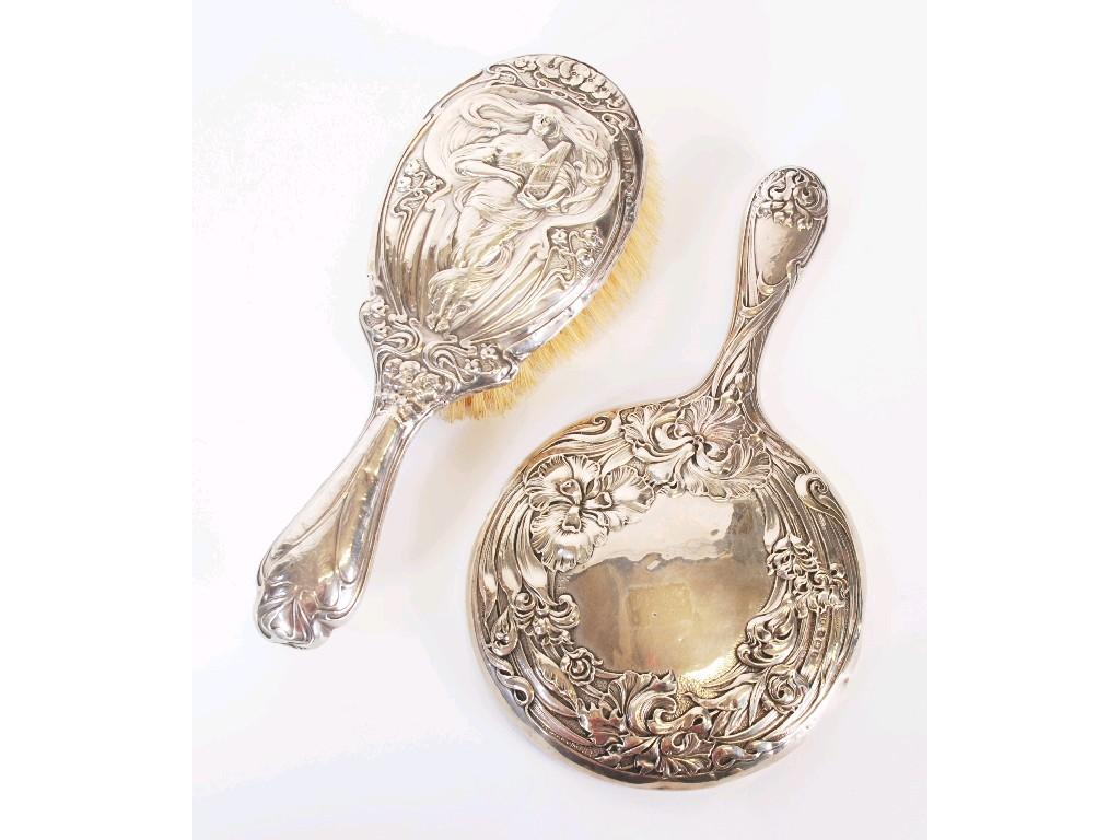 Appraisal: EDWARD VII EMBOSSED SILVER HAND MIRROR with circular bevel edge