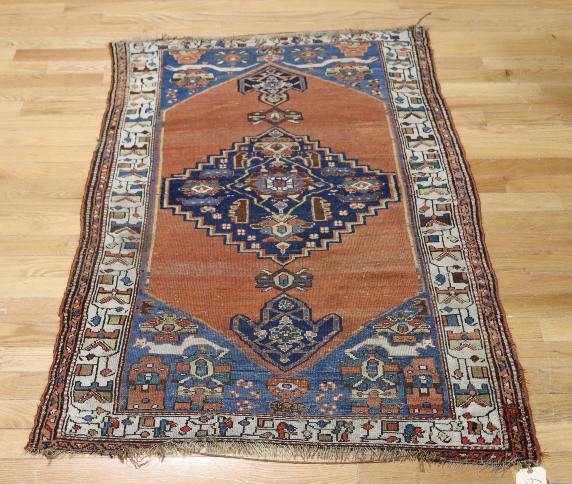 Appraisal: ANTIQUE AND FINELY HAND WOVEN KAZAK STYLE CARPET From a