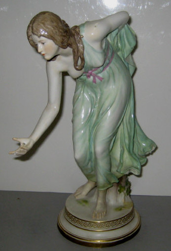 Appraisal: MEISSEN GIRL PLAYING BOWL FIGURE Jugendstil Art Nouveau style designed