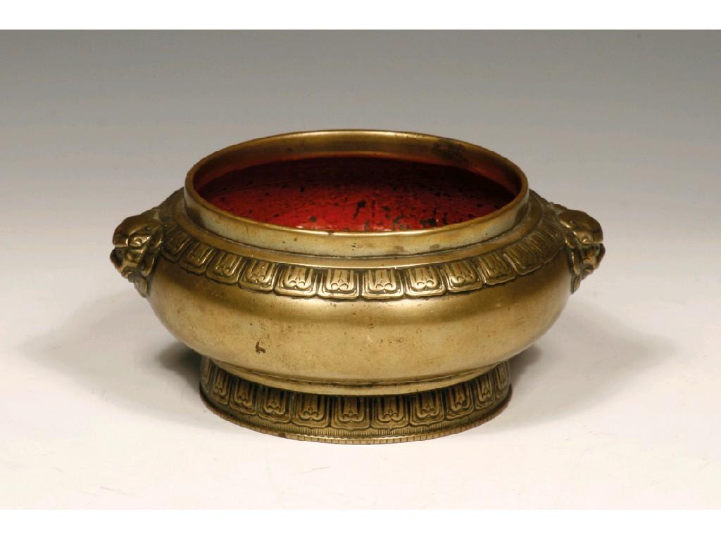 Appraisal: A CHINESE BRONZE CENSER with Buddhistic lion handles and cast