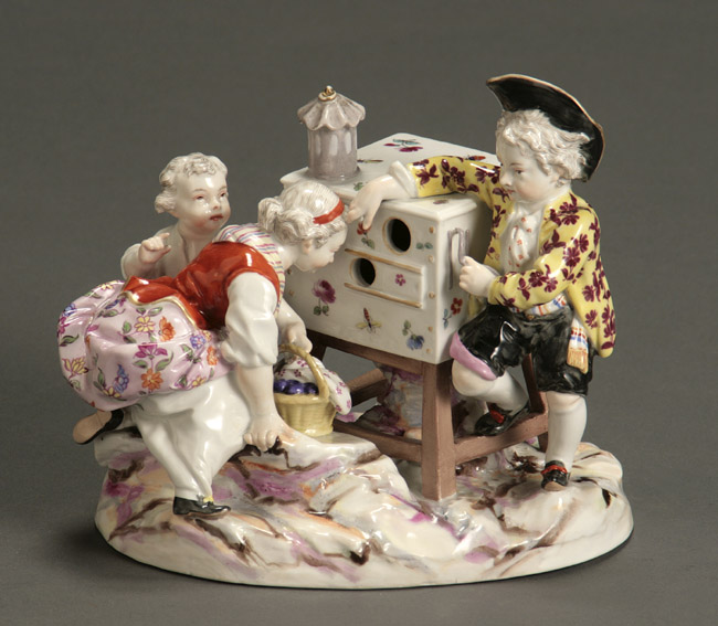 Appraisal: Berlin Figural Group of a Peep Show Circa - Depicting