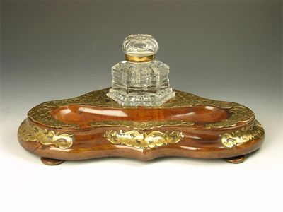 Appraisal: A Victorian walnut and engraved gilt brass mounted inkstand with