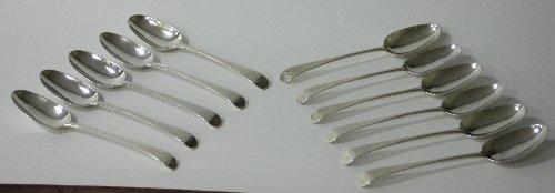 Appraisal: A set of eleven George III silver table spoons IL