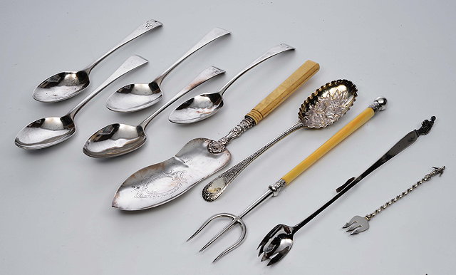 Appraisal: FIVE GEORGIAN SILVER SERVING SPOONS a further Georgian spoon with