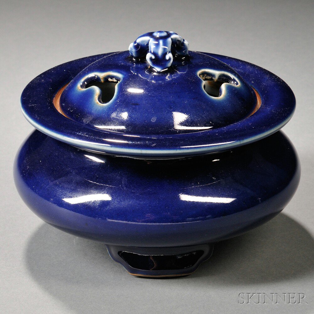 Appraisal: Blue-glazed Tripod Covered Censer China th century compressed bulbous body