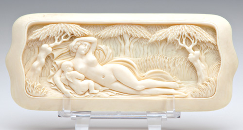 Appraisal: CONTINENTAL IVORY Rectangular plaque depicting Cupid and Aphrodite in forest