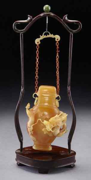 Appraisal: Chinese carved hornbill hanging vase International buyers should note that