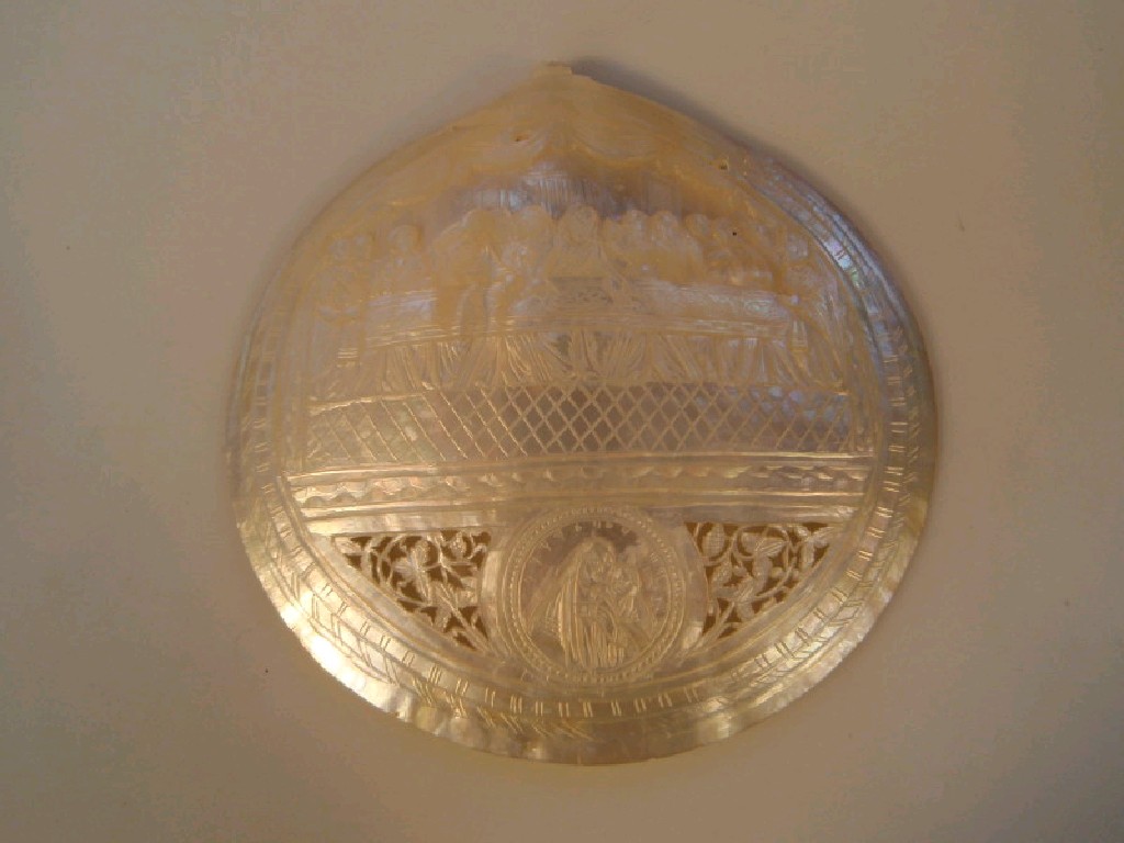 Appraisal: An alabaster shell carved with The Last Supper above a