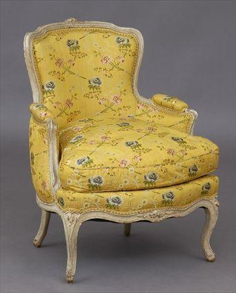 Appraisal: LOUIS XV CARVED AND IVORY-PAINTED BERGERE EN CABRIOLET The shaped