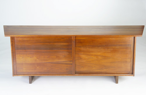 Appraisal: GEORGE NAKASHIMA Walnut credenza with overhanging trapezoidal top and two