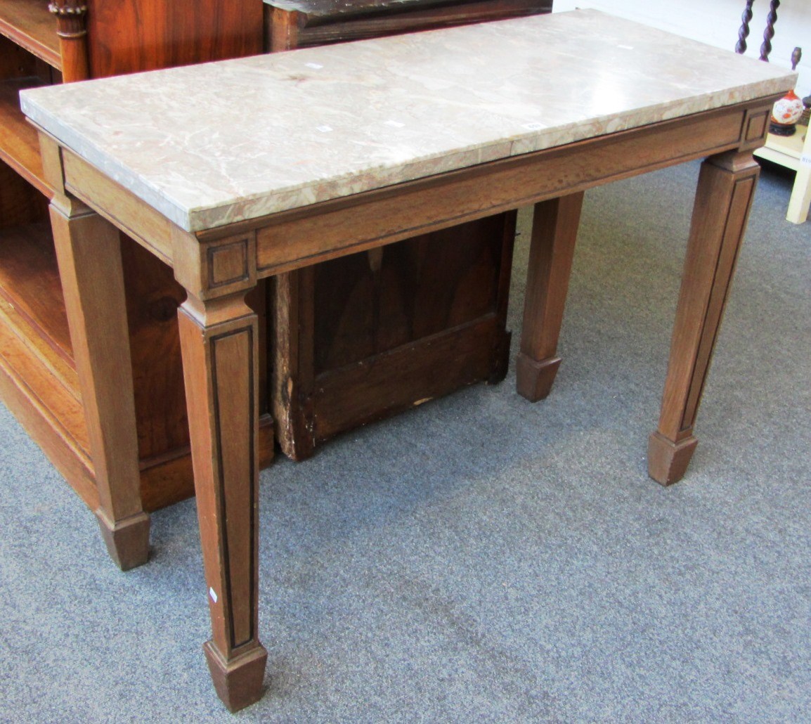 Appraisal: A rectangular marble topped console table the limed oak base