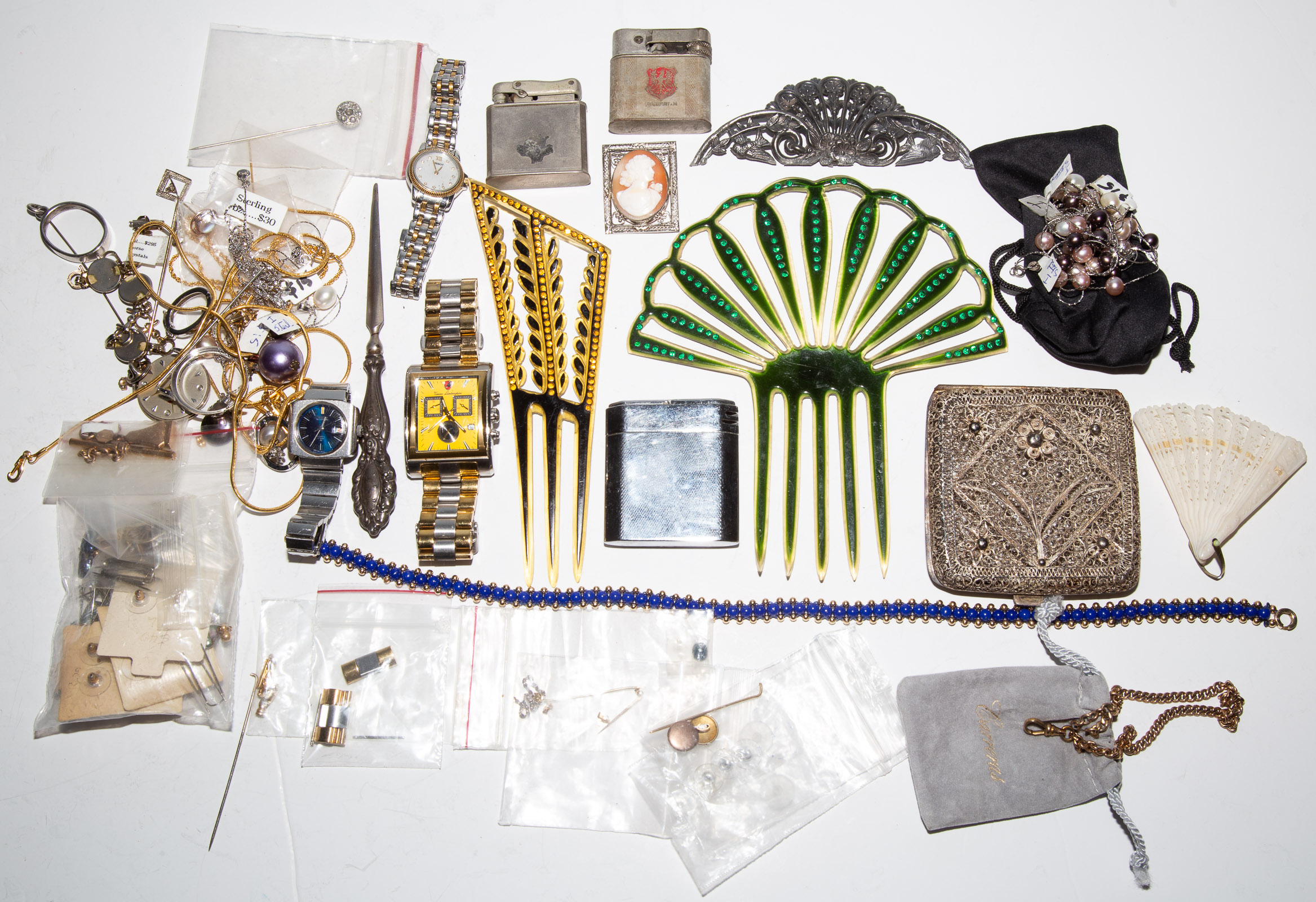 Appraisal: A BAG OF VINTAGE COSTUME JEWELRY ACCESSORIES Including silver toned