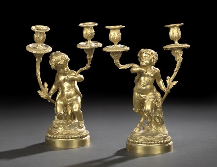 Appraisal: Attractive Pair of French Gilt-Bronze Figural Two-Light Candelabra fourth quarter