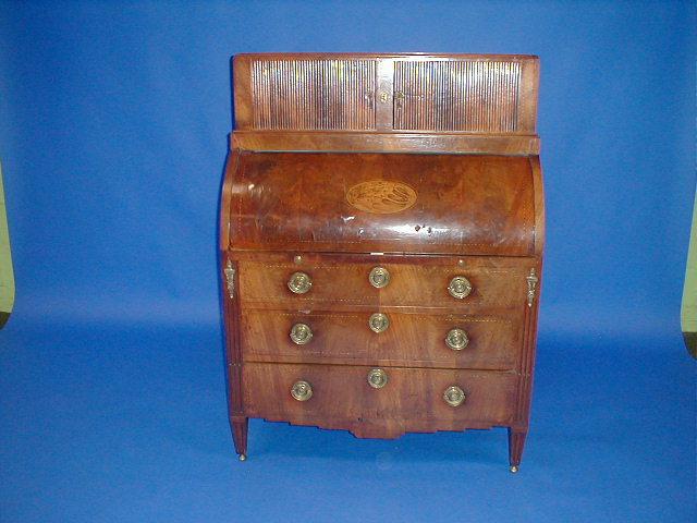 Appraisal: A George III flamed mahogany cylinder bureau with raised top