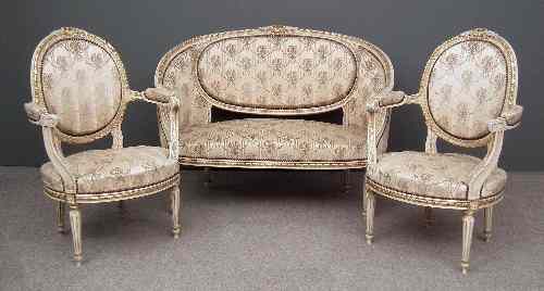 Appraisal: A French cream and gilt decorated three piece drawing room