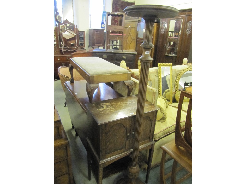 Appraisal: Dressing stool plant stand and an oak smokers cabinet