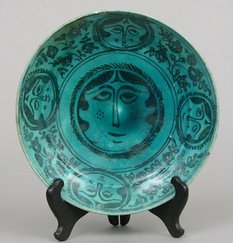 Appraisal: A Persian Plate th Century Pretty blue glaze with female