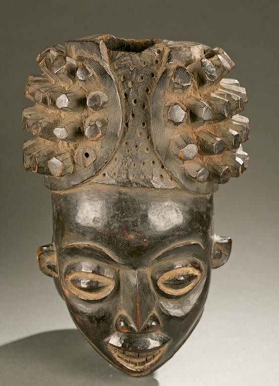 Appraisal: Cameroon Grasslands helmet mask th c A helmet mask with