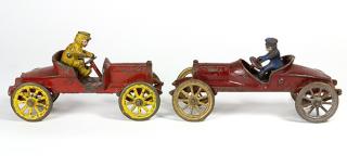 Appraisal: Lot of Cast iron polychrome decorated automobiles with seated riders