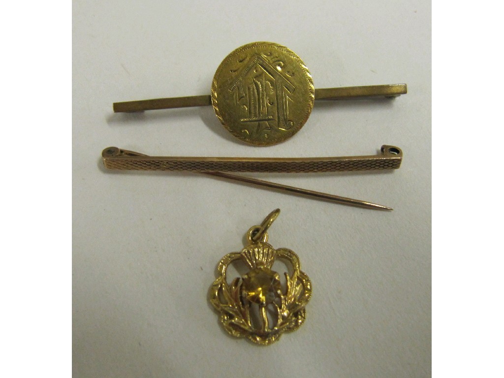 Appraisal: Lot comprising ct gold thistle pendant and two gold bar