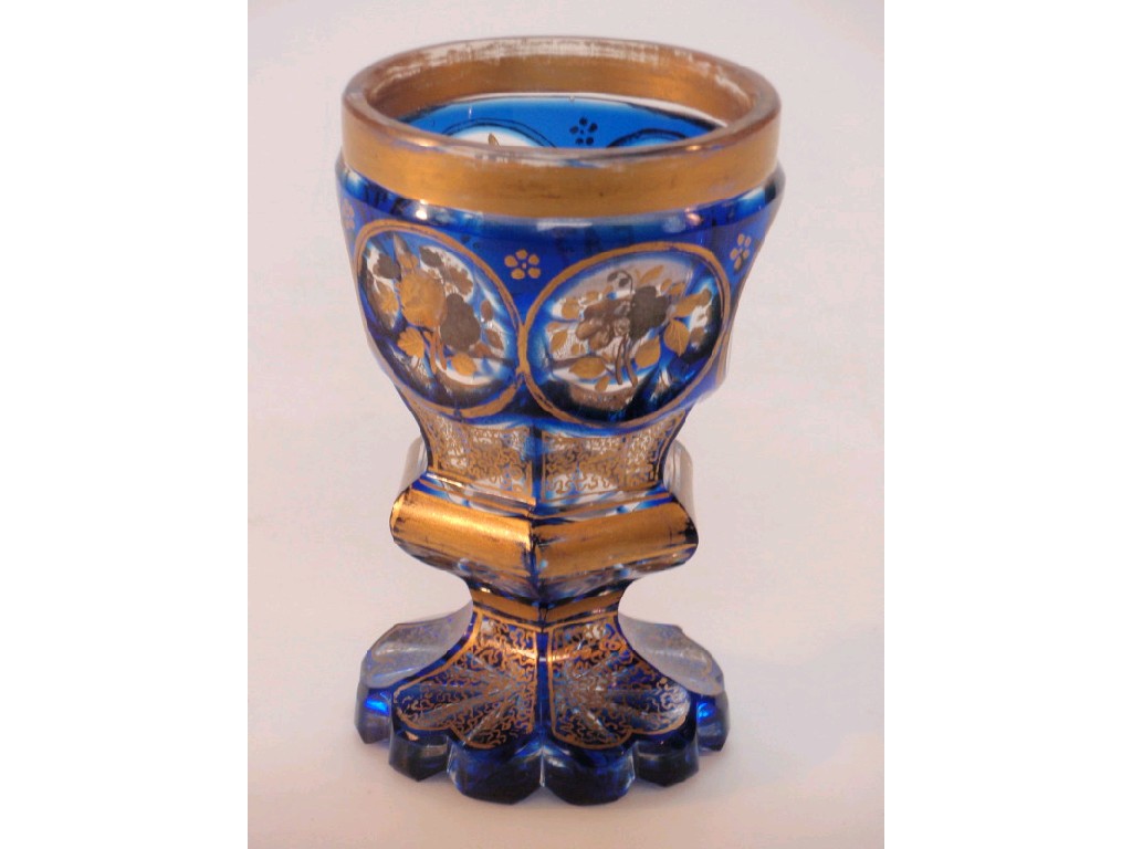 Appraisal: A Victorian slice cut glass rummer with blue flash glass