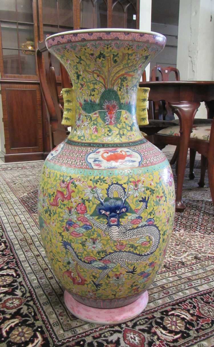 Appraisal: CHINESE FAMILLE JAUNE PORCELAIN FLOOR VASE featuring hand enameled flowers