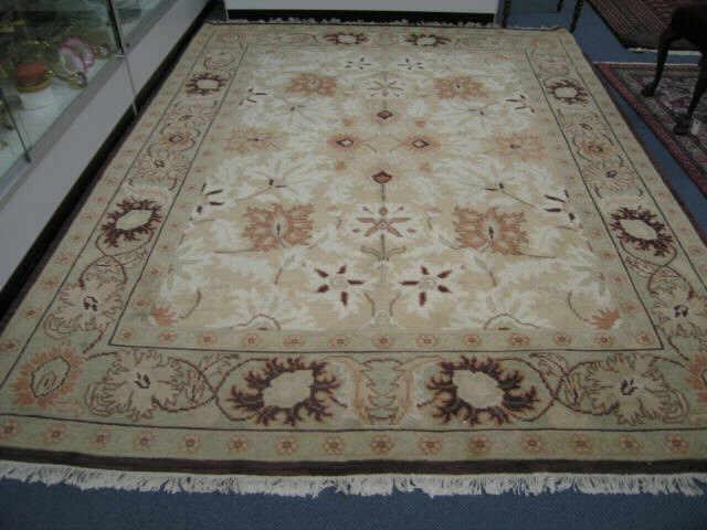 Appraisal: Oushak Chinese Handmade Room Size Rug elaborate floral on soft