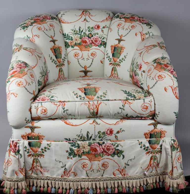 Appraisal: BRUNSCHWIG FILS CLUB CHAIR with downscrolling padded backrest continuing to