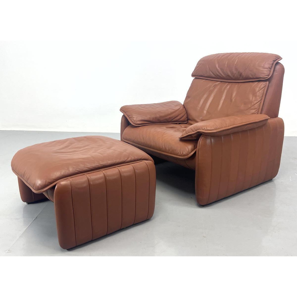 Appraisal: De Sede Leather Lounge Chair and Ottoman Channel leather upholstery