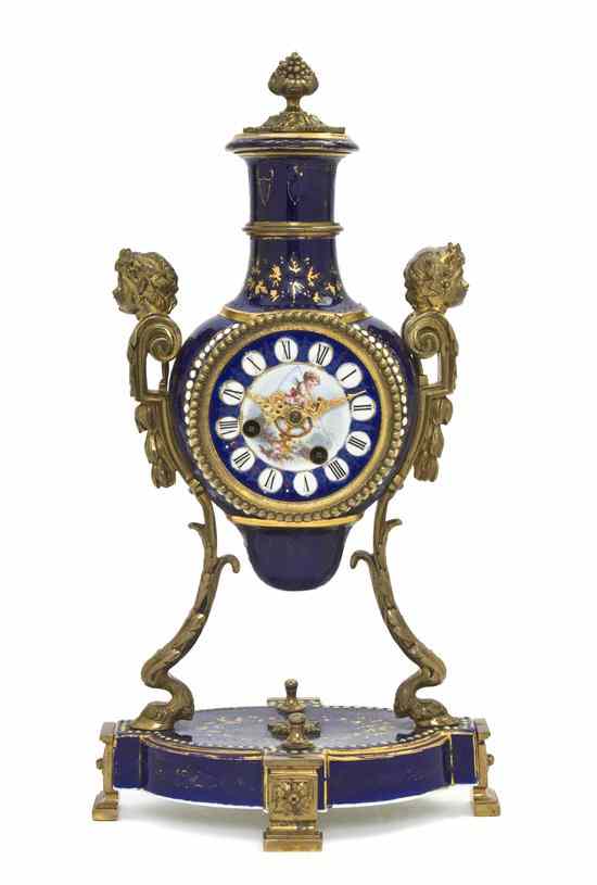 Appraisal: A Sevres Style Porcelain and Gilt Bronze Mounted Mantel Clock