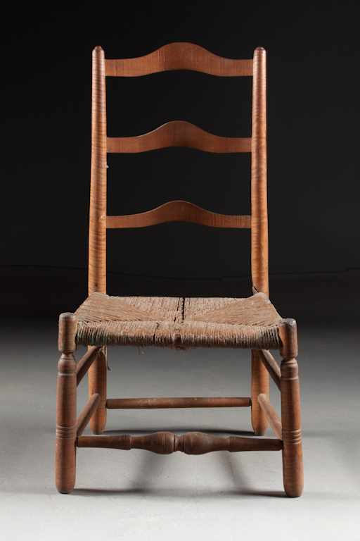 Appraisal: American vernacular tiger maple rush-seat chair th century Estimate -