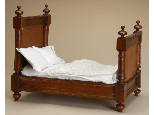 Appraisal: Mahogany Doll's Bed Late th century four turned posts with