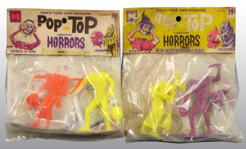 Appraisal: Lot of Halloween Pop-Top Horrors Description Two original store packages