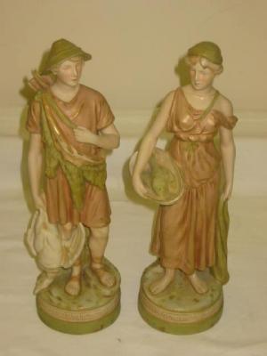 Appraisal: A PAIR OF ROYAL DUX PORCELAIN FIGURES modelled as a