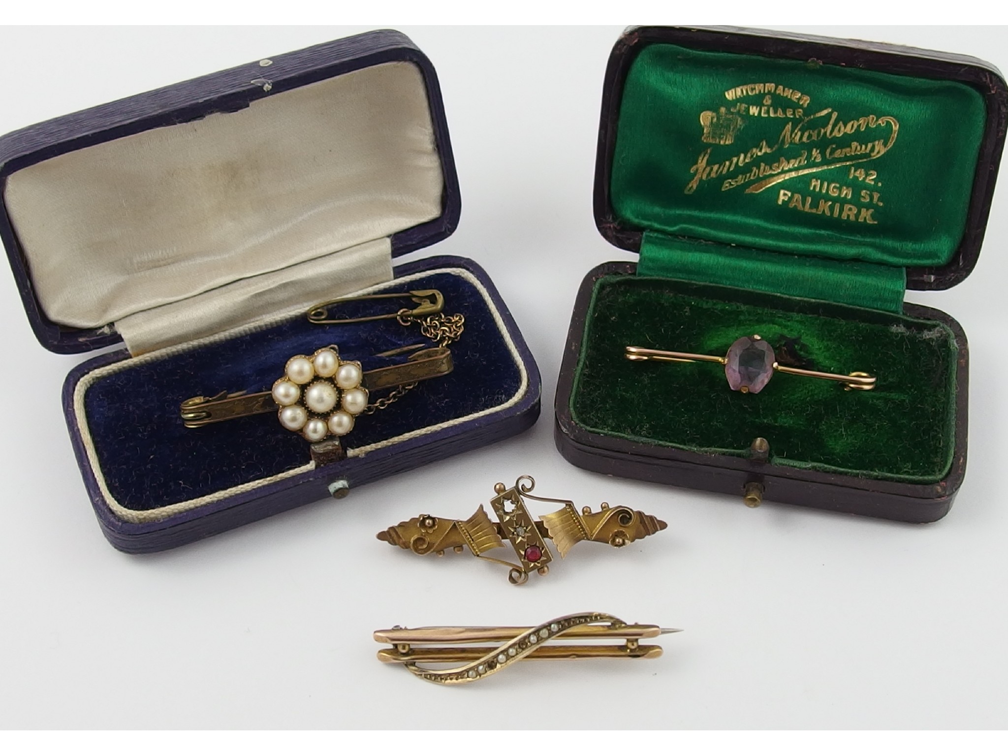 Appraisal: Four ct gold and yellow metal brooches set with pearls