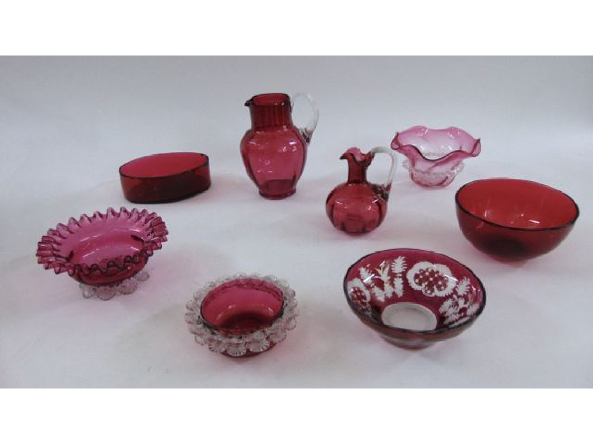 Appraisal: Eight pieces of Victorian cranberry glass including a jug with